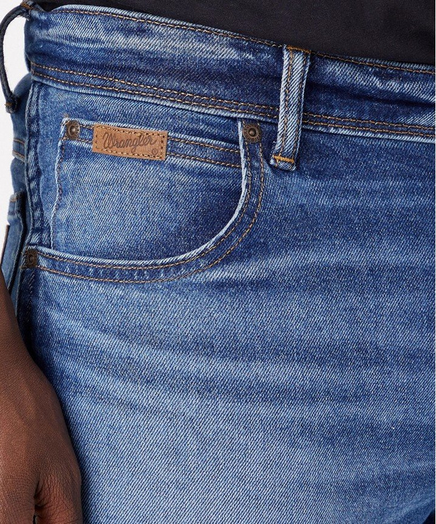WRANGLER TEXAS SLIM MĘSKIE SPODNIE JEANSOWE JEANSY COWBOY HERO W12SU823O 112320040