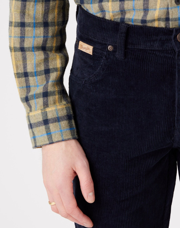 WRANGLER TEXAS MĘSKIE SPODNIE SZTRUKSOWE SZTRUKSY NAVY W121A2114 112320064
