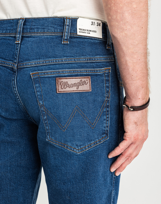 MĘSKIE SPODNIE JEANSOWE WRANGLER TEXAS SLIM GAME ON W12ST112E 112126517