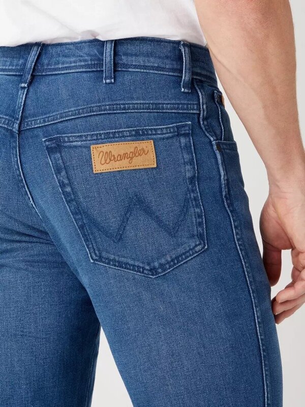 WRANGLER TEXAS MĘSKIE SPODNIE JEANSOWE JEANSY ARIES BLUE W121AG42A