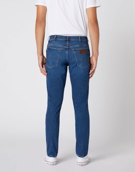 MĘSKIE SPODNIE JEANSOWE WRANGLER TEXAS SLIM GAME ON W12ST112E